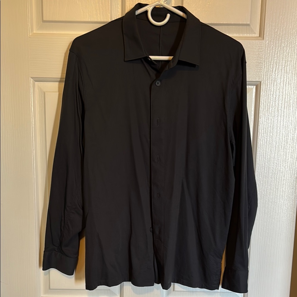 Lululemon Relaxed fit long sleeve Black Button-Up Shirt.  Color is Obsidian